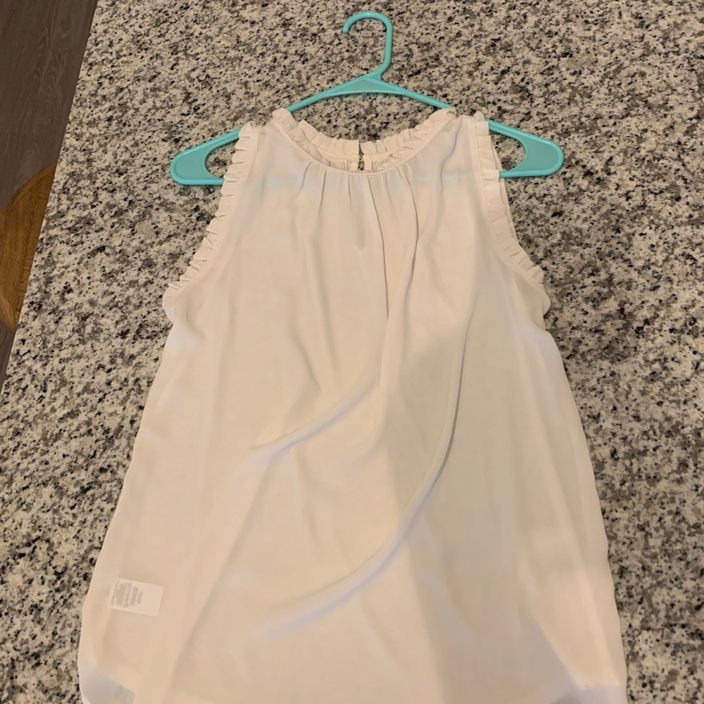 White Sleeveless Blouse